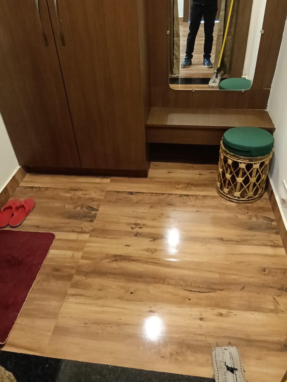 Luxury resort pool with palm trees at sunset